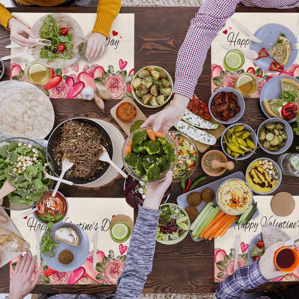 Sailorine heart-and-rose placemats around a table filled with dishes