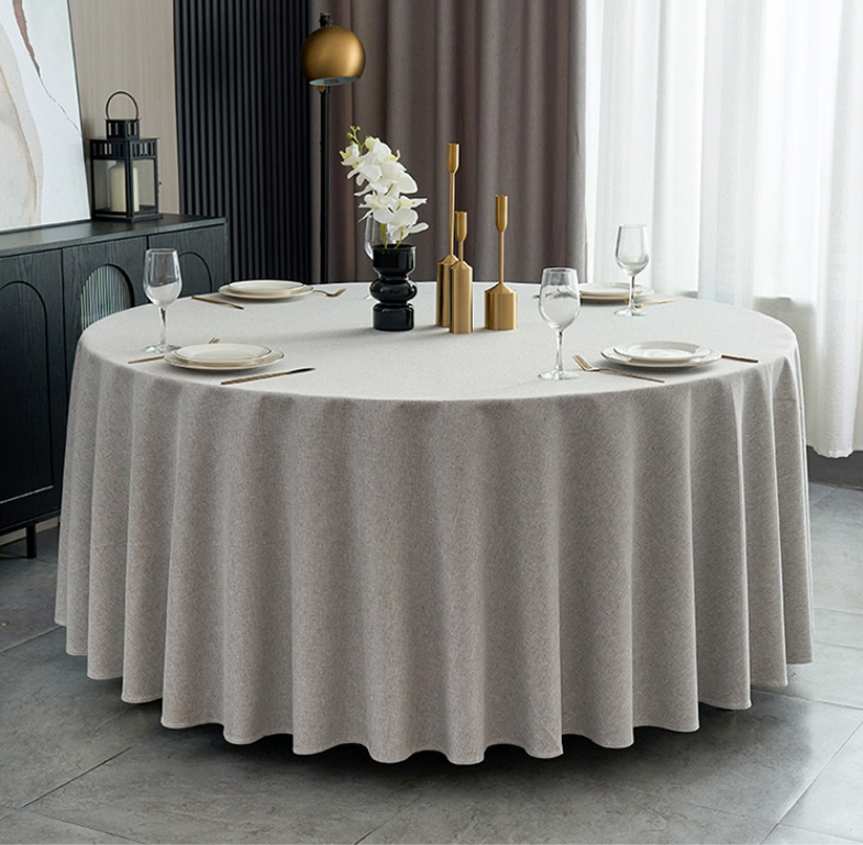 Sailorine light gray round tablecloth in a dining room setting