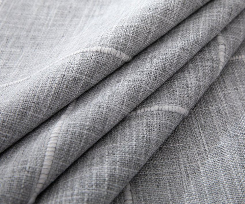Sailorine close-up of gray tablecloth folds and woven texture