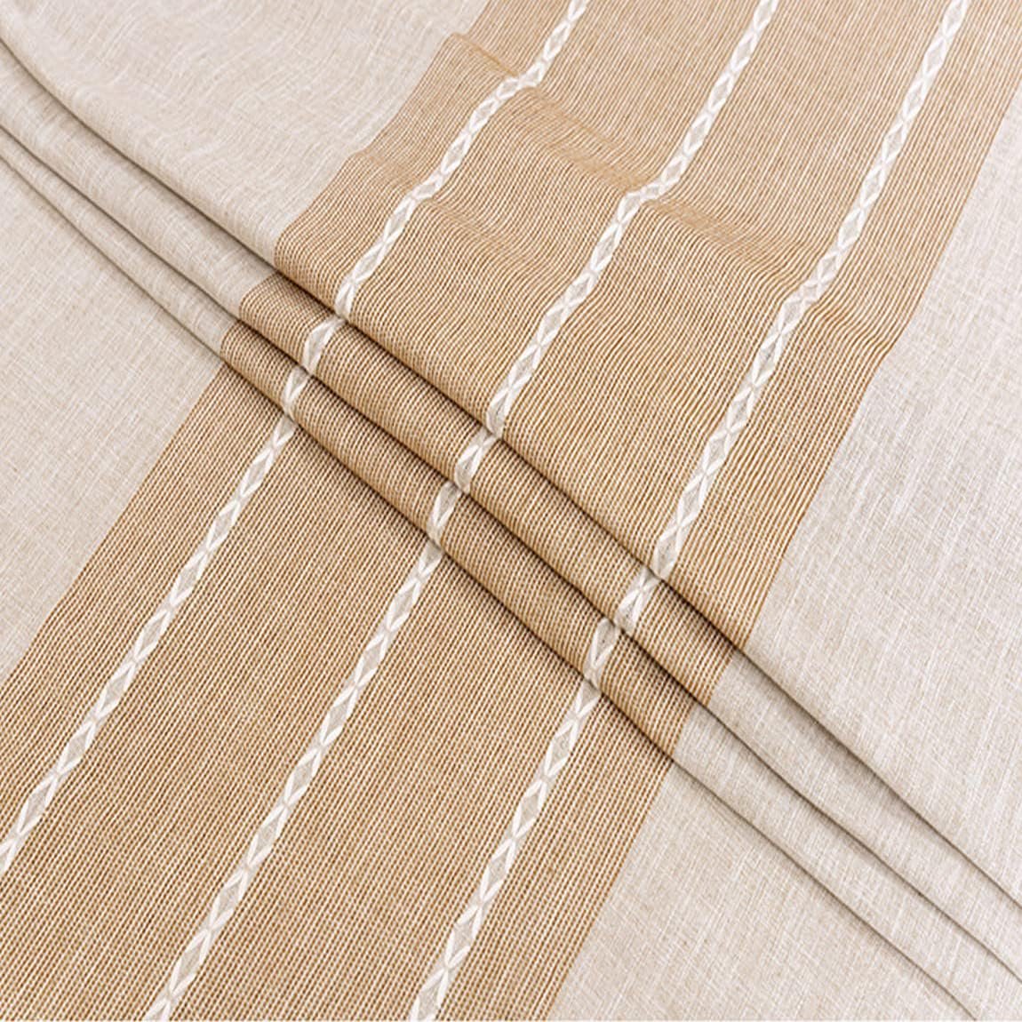 Sailorine close-up of the tablecloth's tan stripe and white stitched lines